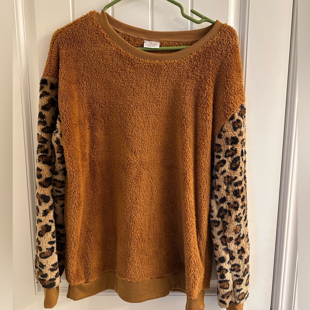 Women’s fuzzy leopard sweatshirt